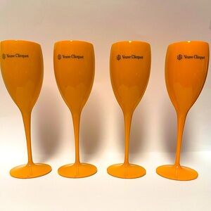Four (4) acrylic Veuve Clicquot signature orange flute set. 🧡